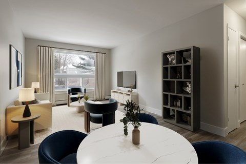 A modern living room with a white table and blue chairs.