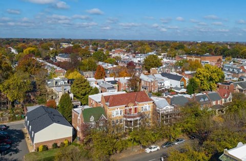 A small town with a mix of residential and commercial buildings.