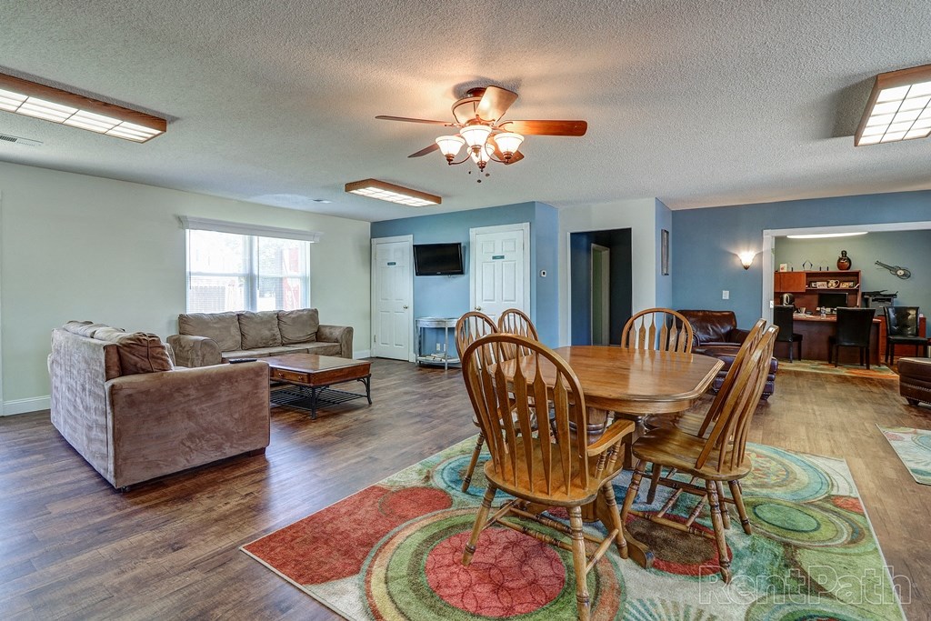 the living room and dining room are open to the kitchen and living room