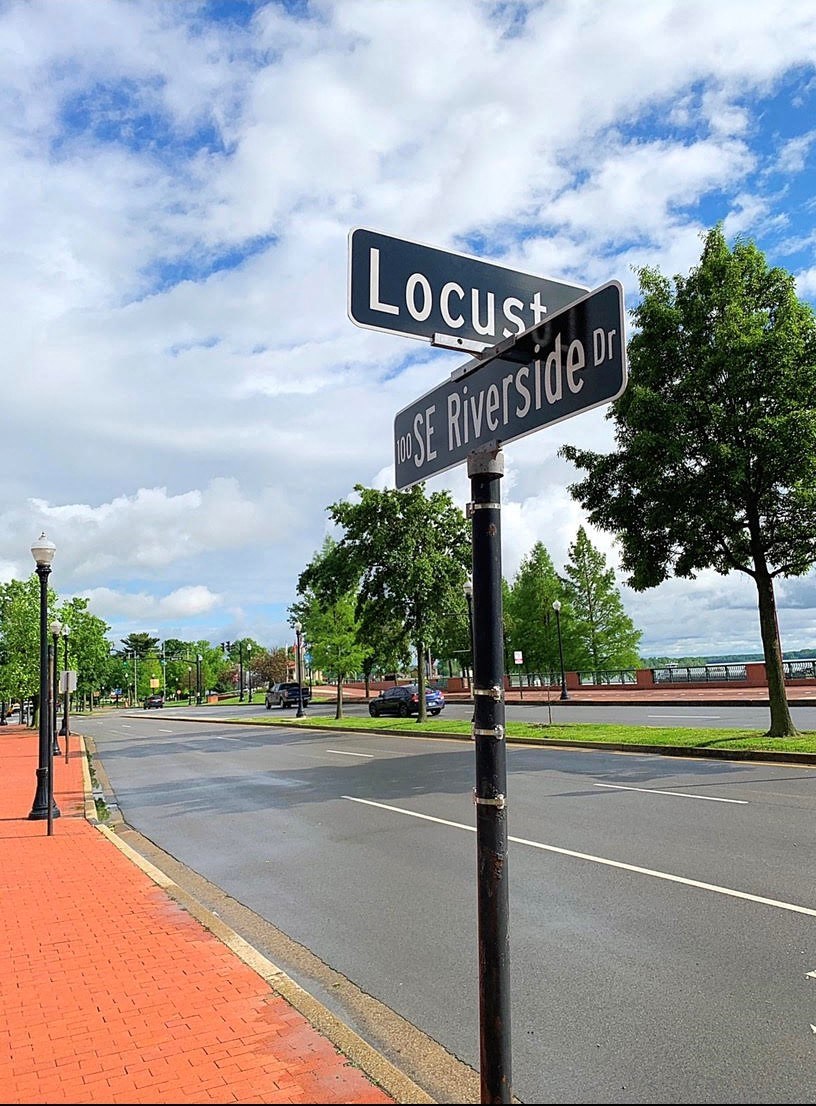 a street sign on the side of a street
