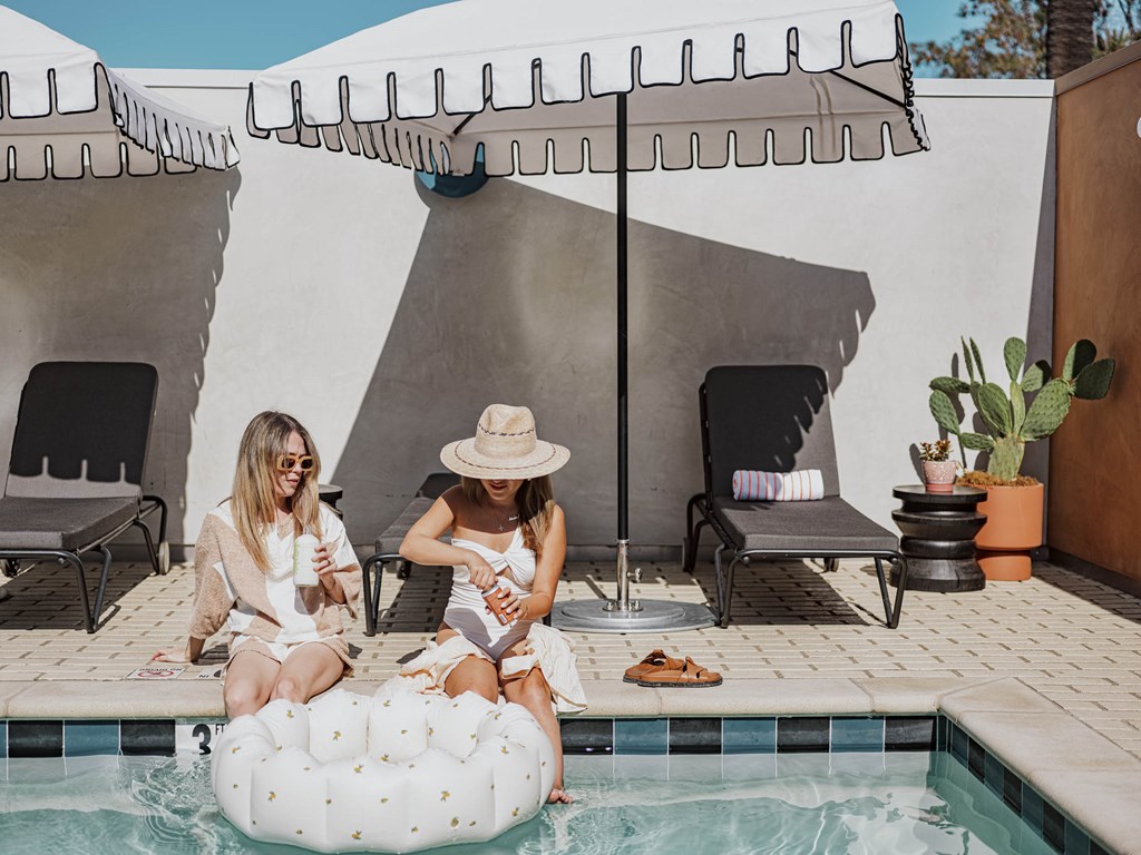 Relaxing Near A Pool at Alsace Living, Los Angeles, California