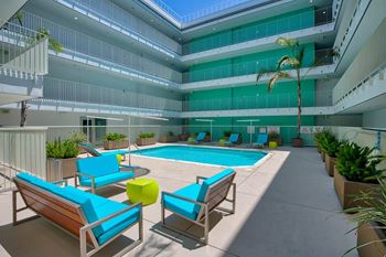 Pool With Relaxing Chairs at 1800 Whitley, Los Angeles, 90028