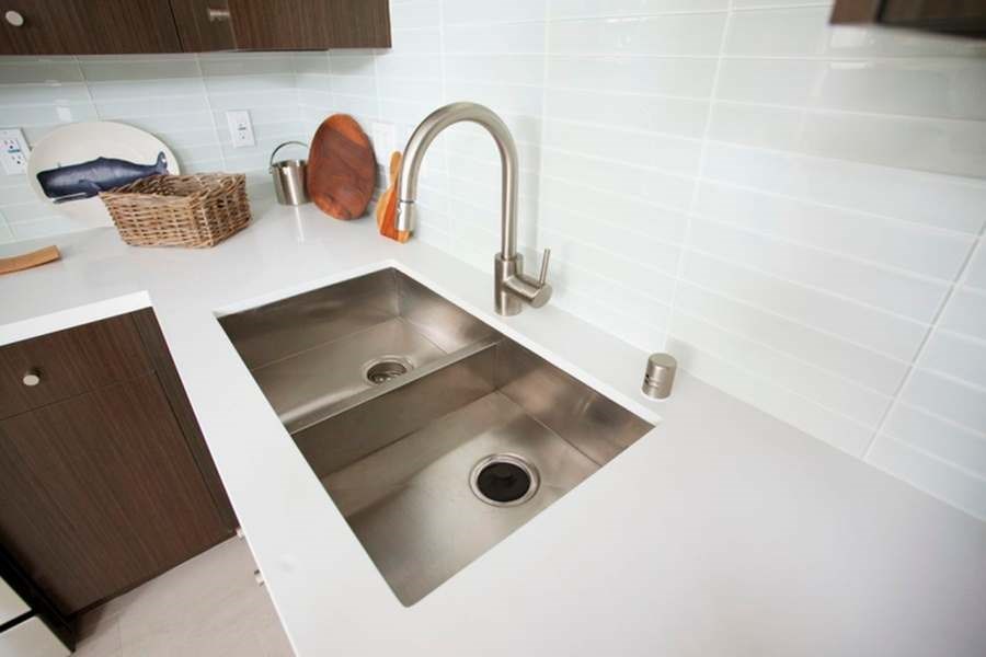 A kitchen sink with a silver faucet at 1800 Whitley, Los Angeles, 90028