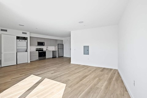 A kitchen area with a refrigerator, oven, and microwave.at The Wilson, California