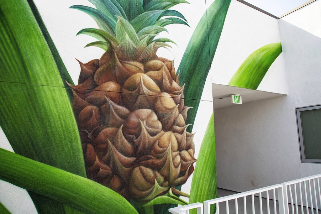 A pineapple mural on the side of a building.at Junction 4121, Los Angeles, CA