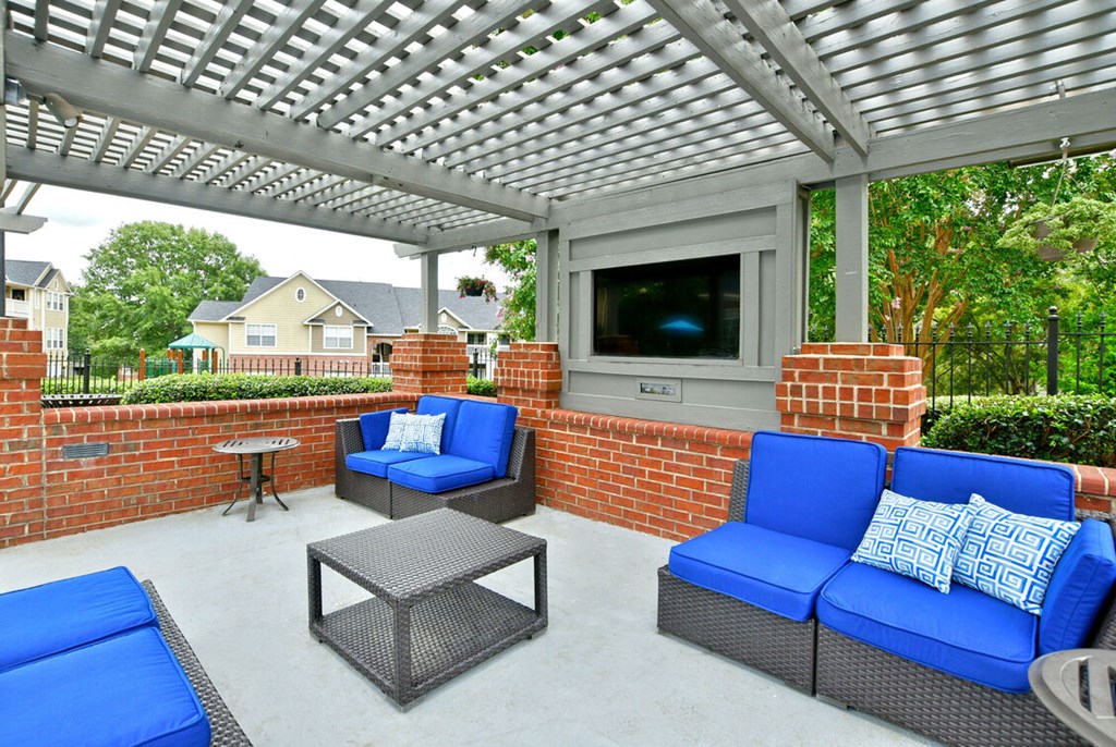 Outdoor Patio With TV at Braxton Woods Lake, Greenville