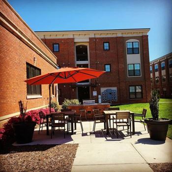 Outdoor Patio at Riverside Flats at Aberfoyle Village, Belmont, NC 28012