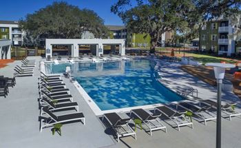 A large swimming pool surrounded by sun loungers. at Mariner Grove, Savannah, GA