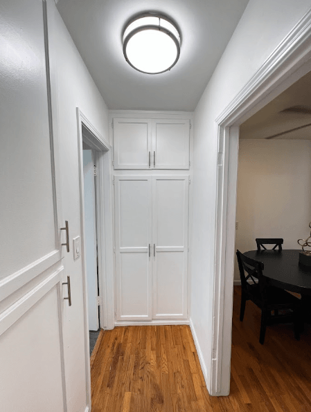 A small room with a table and chairs.