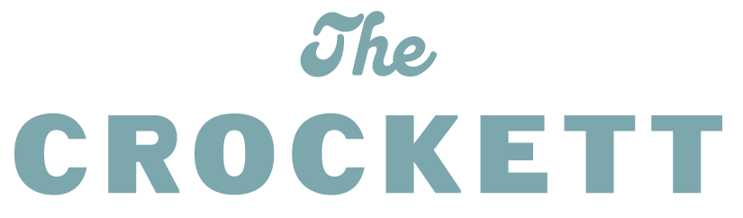 A solid teal colored background with no distinguishable objects.