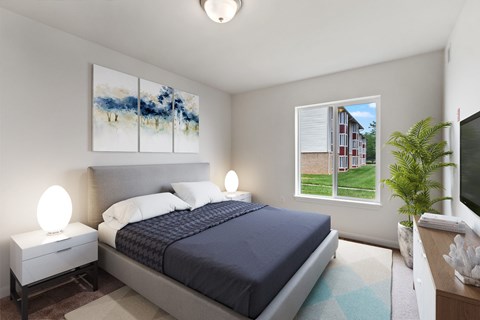 A bedroom with a large bed and a painting on the wall.