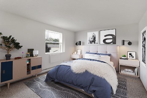 A bedroom with a large bed and a wooden cabinet.