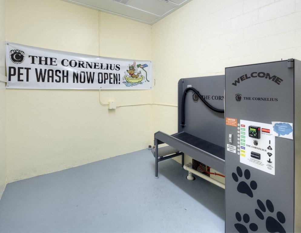 A pet wash station with a sign.