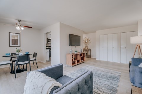 Contemporary living space with dining and storage at Canterbury Square Apartments, Michigan, 48083