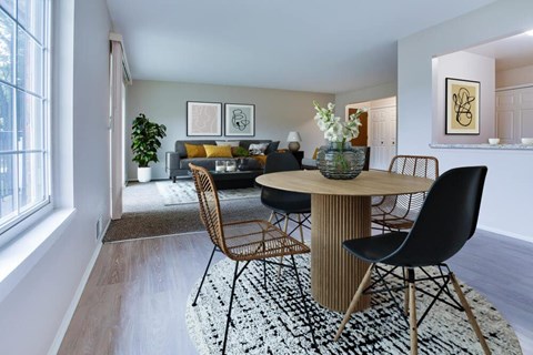 Modern dining room with living room view at Lancaster Hills Apartments, Southfield, MI