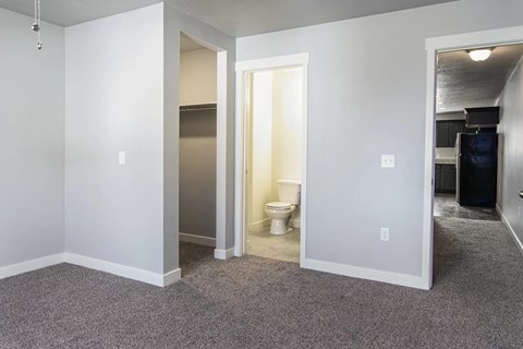 A bathroom with a toilet and sink is shown.