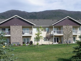 an image of a large house with a grass yard