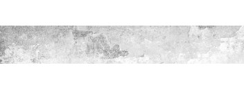 A white wall with a rough texture.