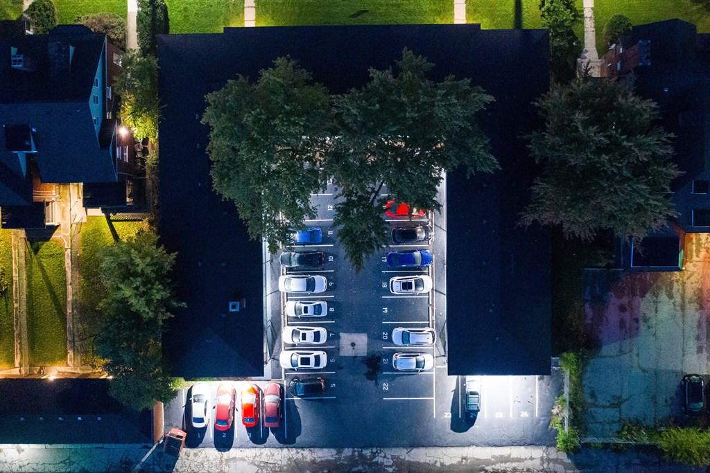 A parking lot with cars parked in it.