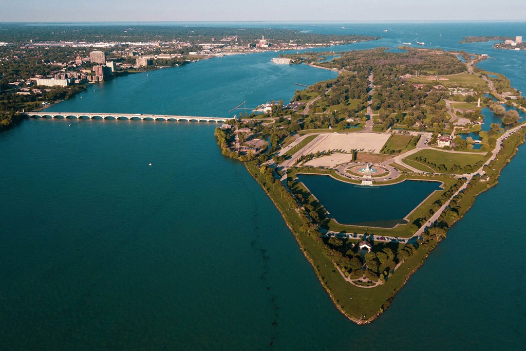 A bridge spans a body of water, connecting two land masses.