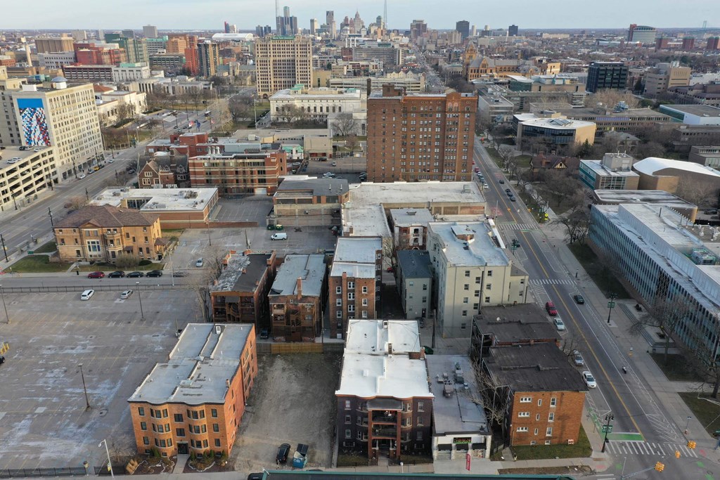 A cityscape with buildings and roads.
