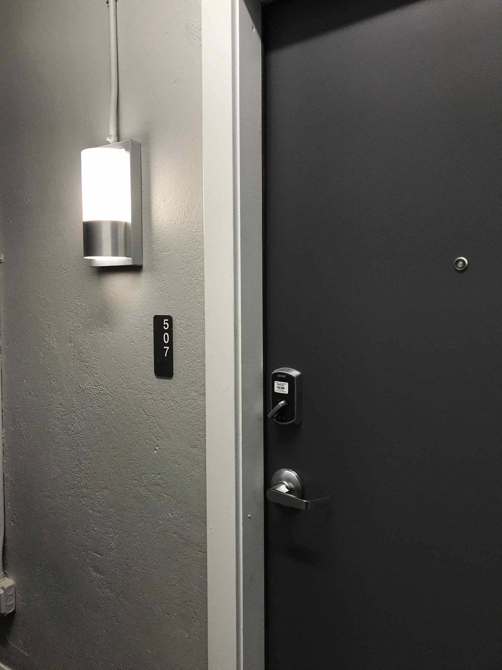 the light on the wall of a bathroom door