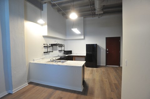 a view of the kitchen from the living room