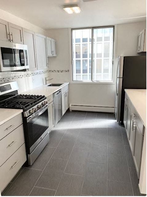 a kitchen with a stove and a refrigerator