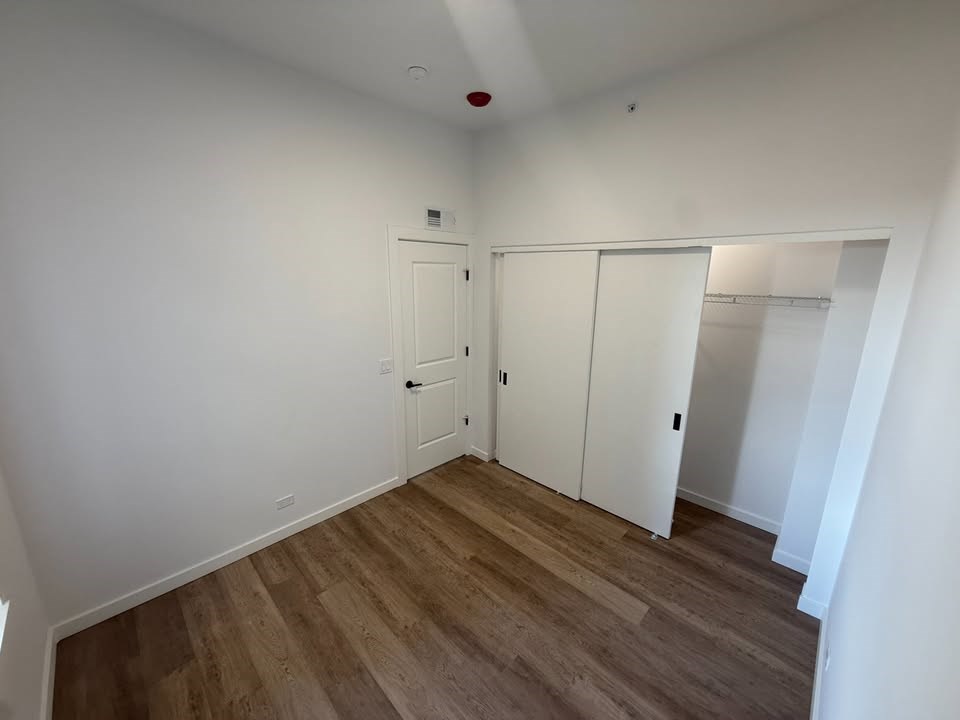 Bedroom With Closet at The Nest at Lincoln Park West, Illinois