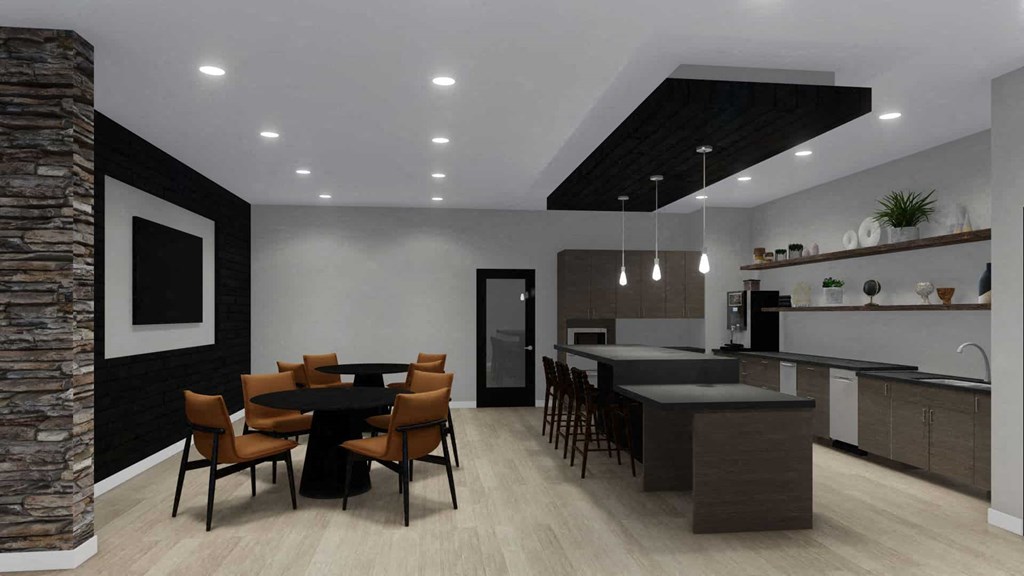 A modern kitchen with a dining table and chairs.