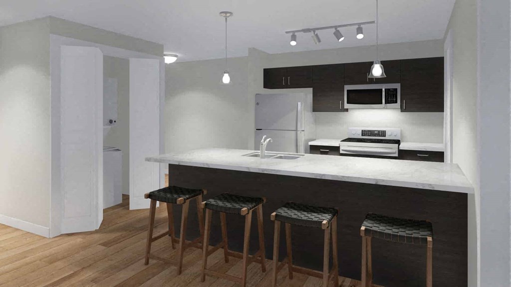 A kitchen with a white countertop and bar stools.