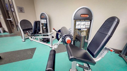Row of exercise machines in fitness center at Civic at Frisco Square Apartments, Frisco, TX, 75034