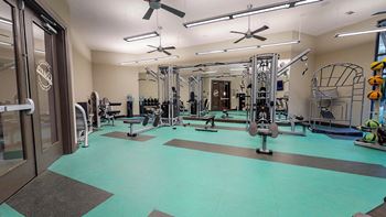 Gym with a exercise bike at Civic at Frisco Square Apartments, Frisco