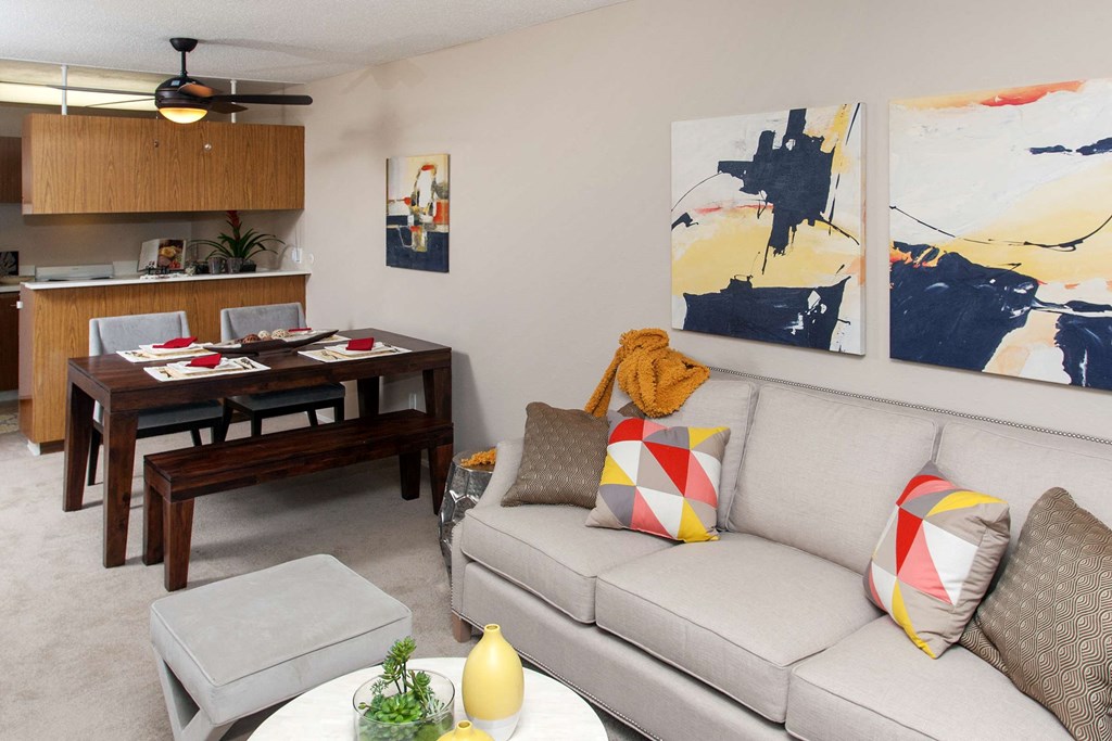 a living room with a couch and a table