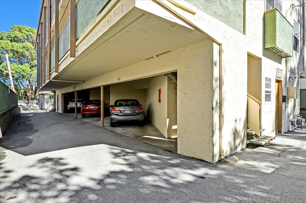 a parking garage with a car parked in it