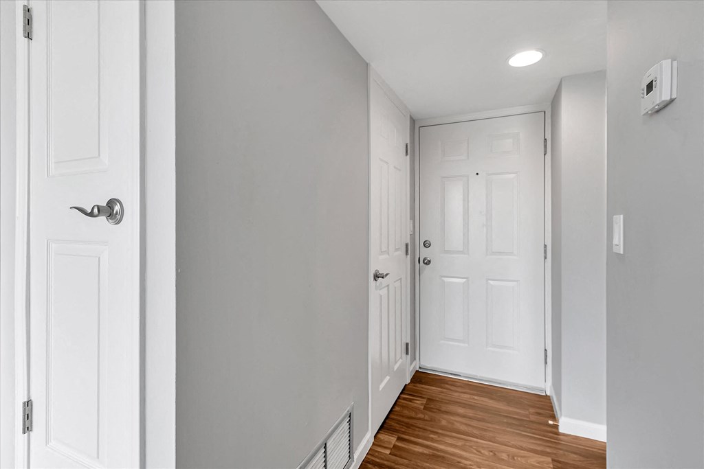Entryway hallway with coat closet