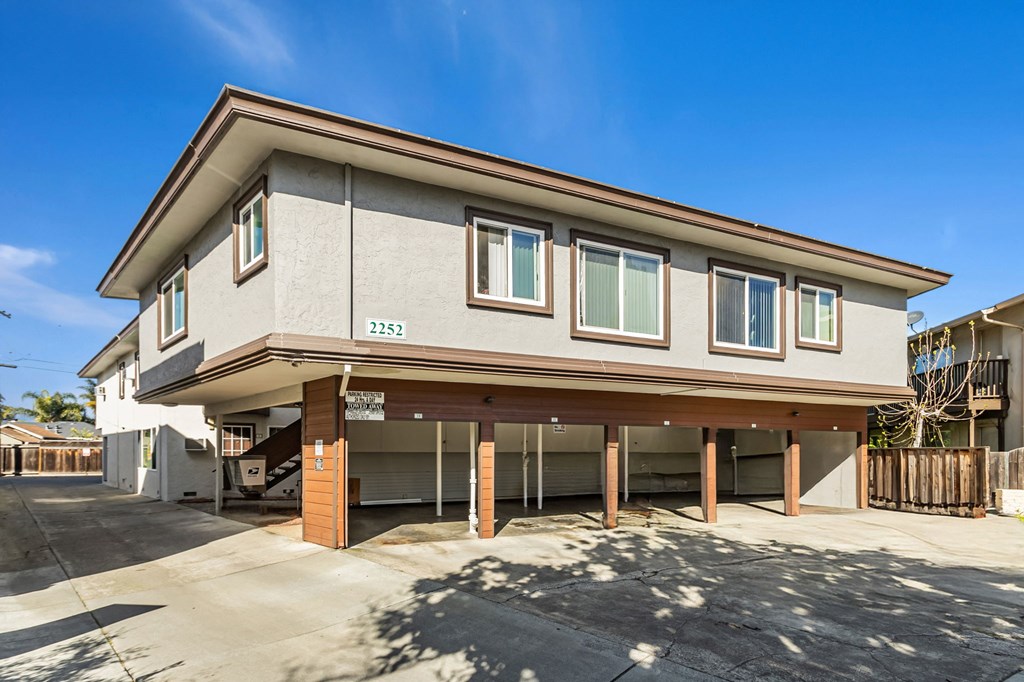 A two-story house with a garage is numbered 2253.