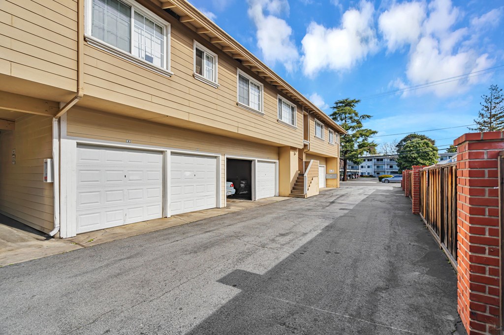 A row of garages and driveways.