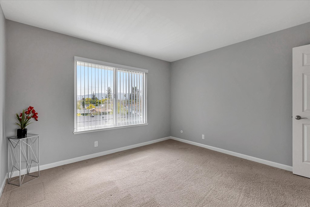 Large bedroom with large window