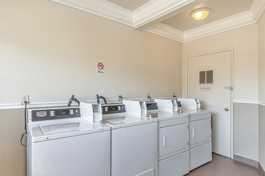A row of sinks in a public restroom.