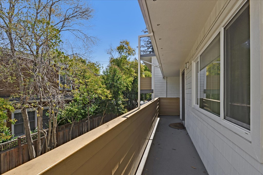 a long porch with a large window
