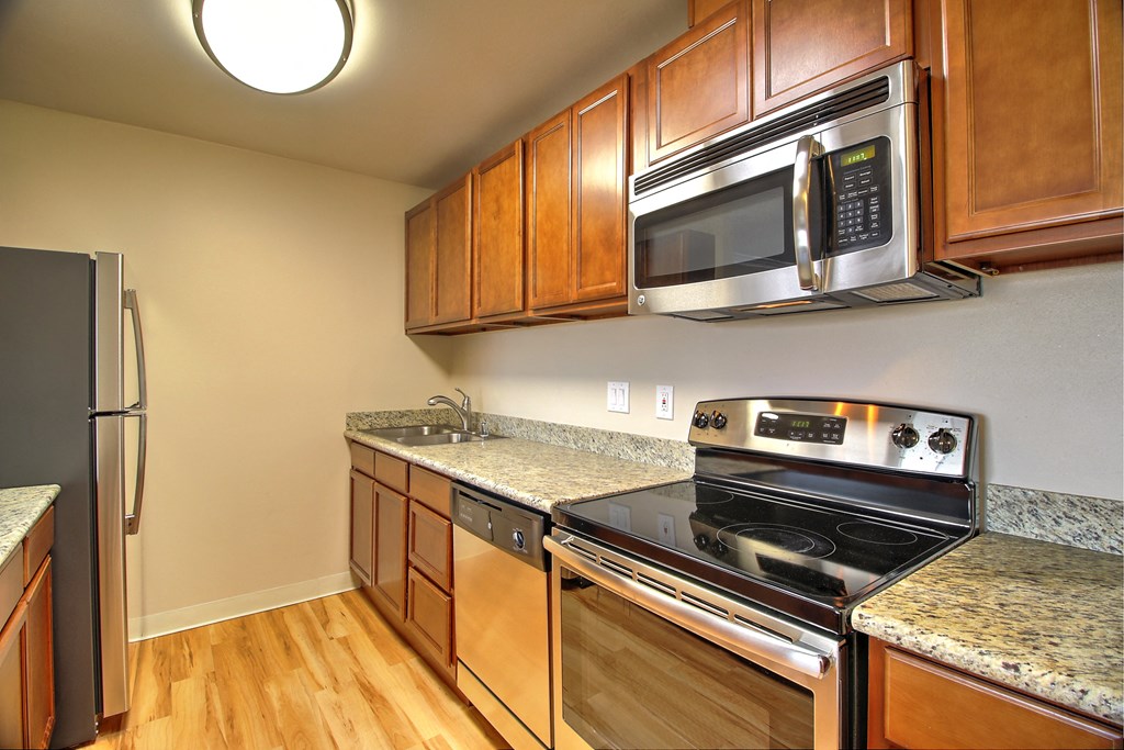 Kitchen gallery with appliances at Madison Place, San Mateo, CA