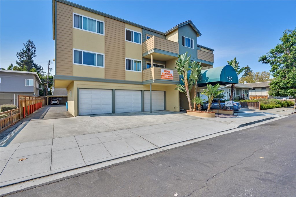 a building with a garage door in front of it