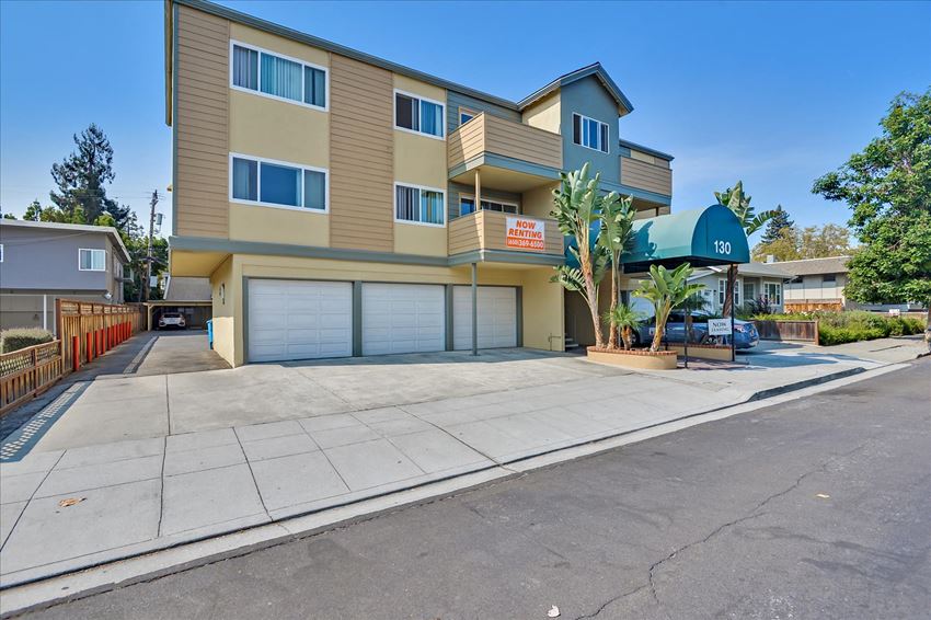 a building with a garage door in front of it