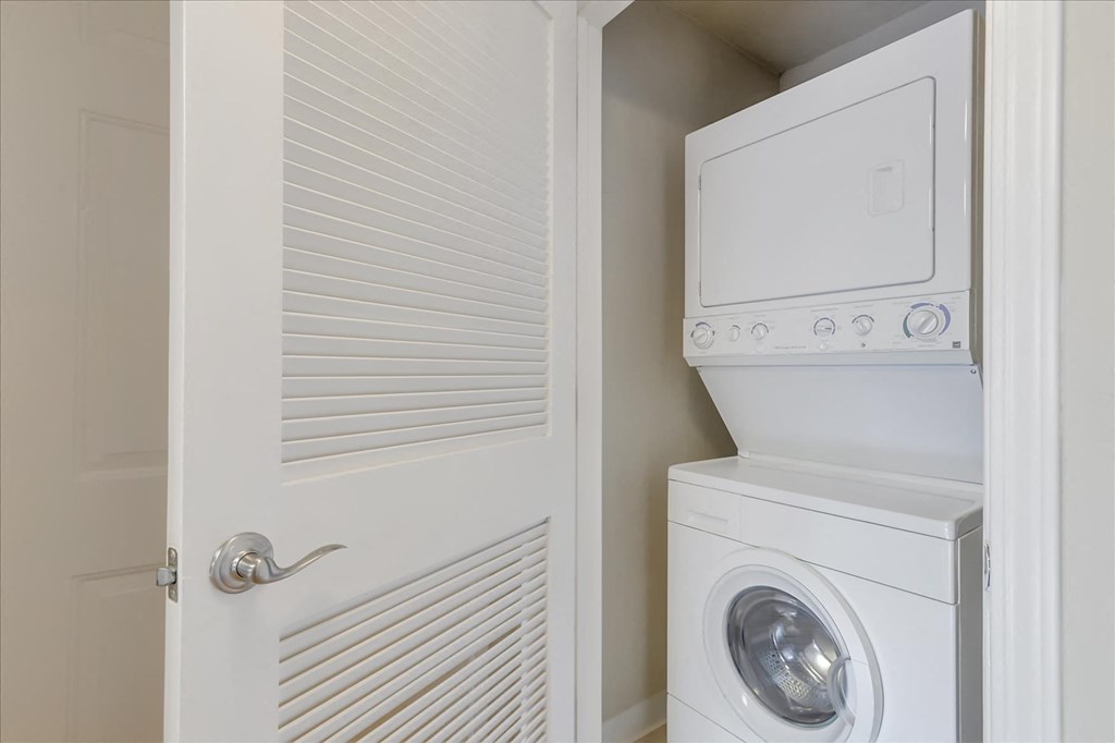 a laundry room with a washing machine and a dryer