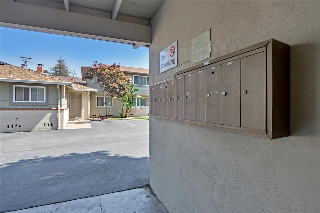A no smoking sign is posted on a wall.