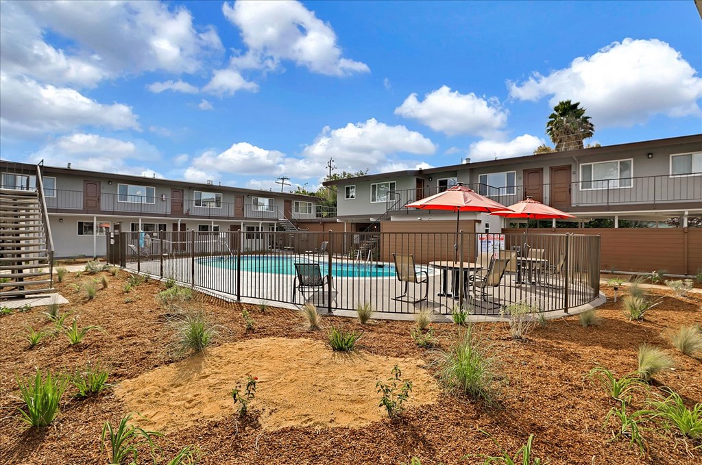 our apartments have a fenced in pool and patio