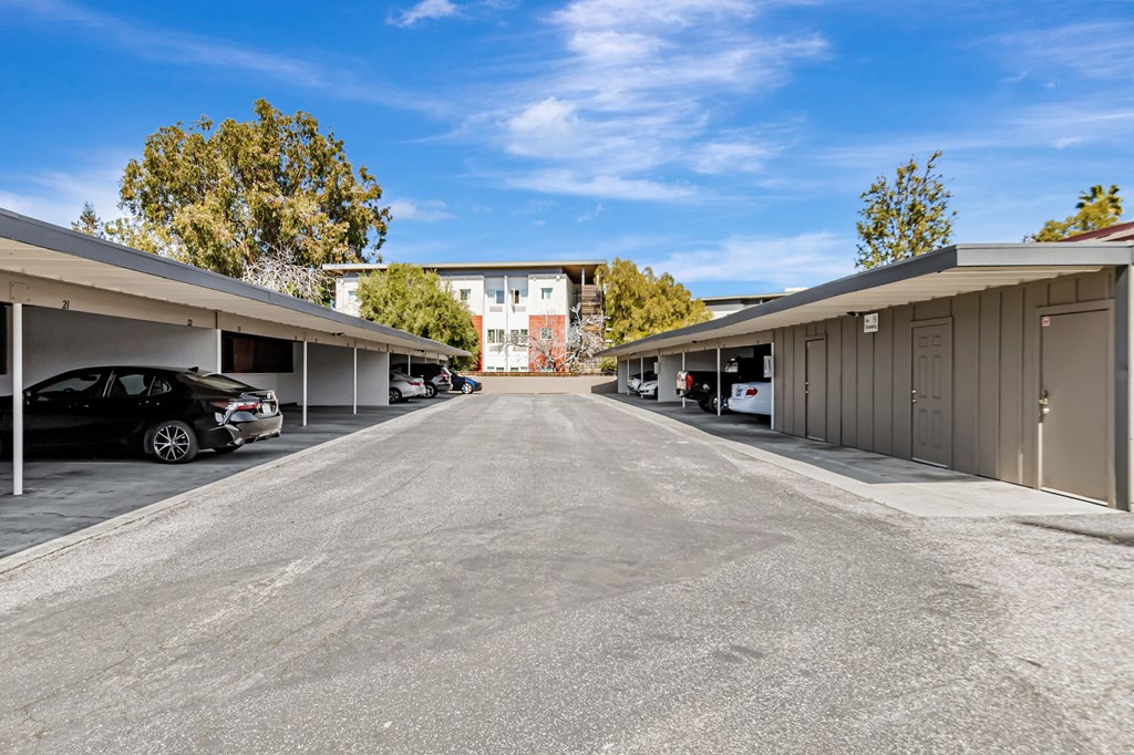 A parking lot with cars parked in it.
