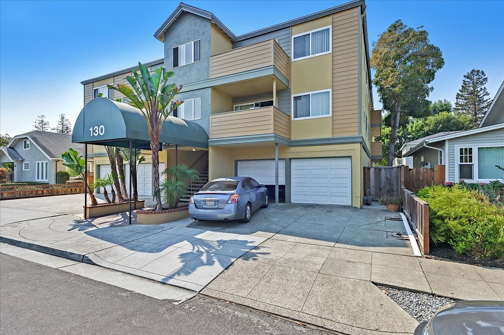 the building with a car parked in front of it