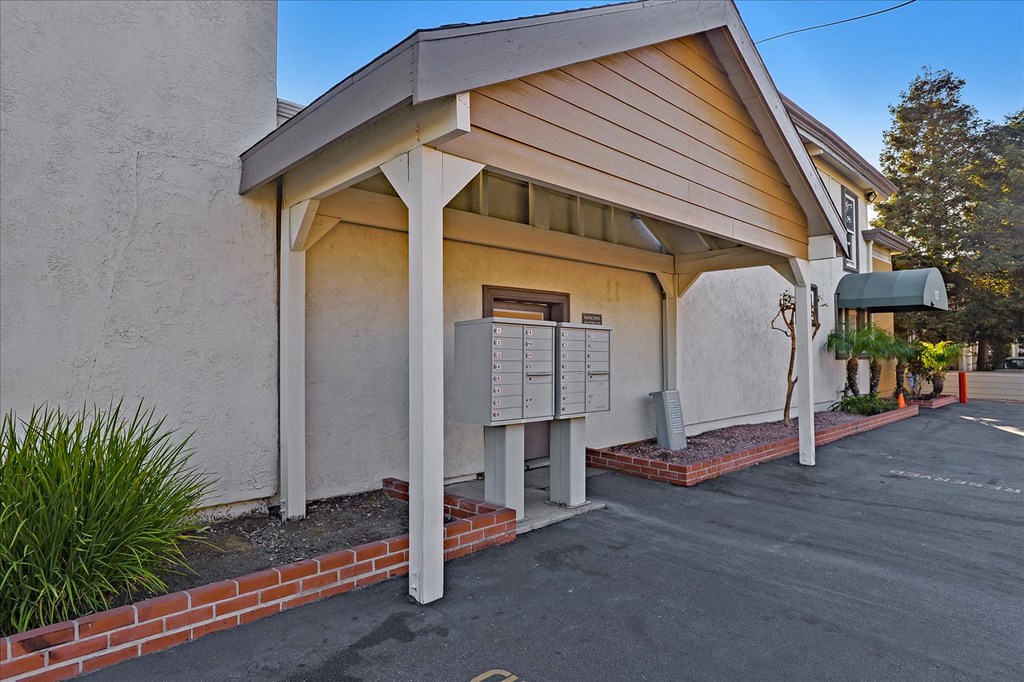 a building with a parking meter in front of it